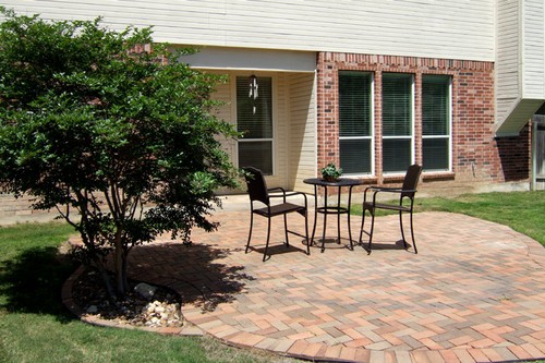 step from the breakfast room out to a brick patio
