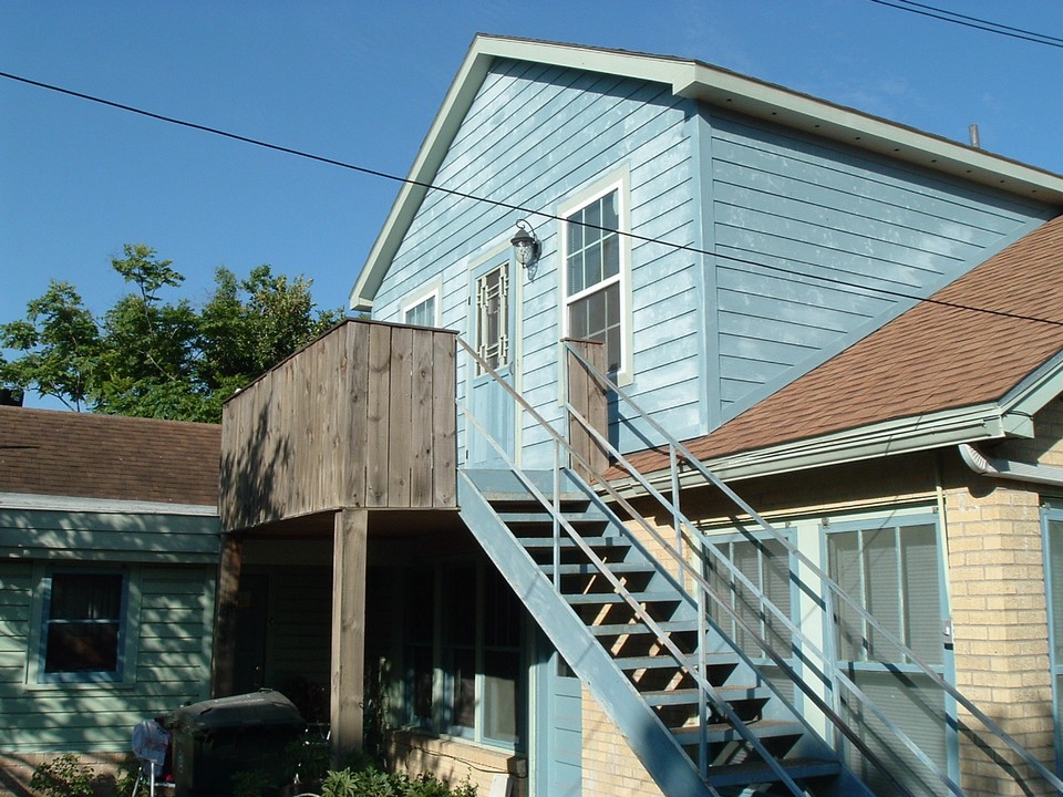 balcony entrance to the captains quarters above the main house and crab shack studio