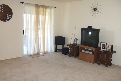 living room towards sliding doors to covered patio