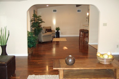 view of dining/living area and breakfast bar from family room