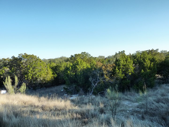 the lot has 130 feet of frontage on paradise hills and extends 340 feet back