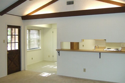 family room view toward patio door and breakfast nook