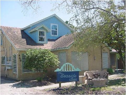 front of the home showing the remodeled main house and added one-bedroom unit upstairs the cozy and quaint seaside inn, located on eldon drive between s. alameda and ocean drive