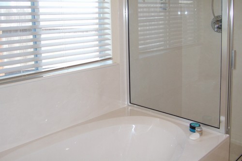 sparkling master bathroom with garden tub and separate shower