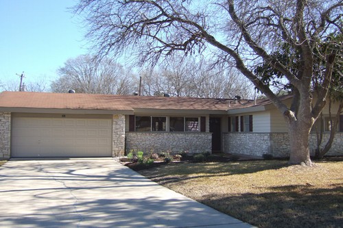 landscaping and shade trees all around the home