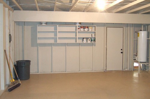 shelving, door to back yard, and plenty of storage space