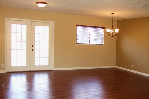 living and dining area with doors to patio