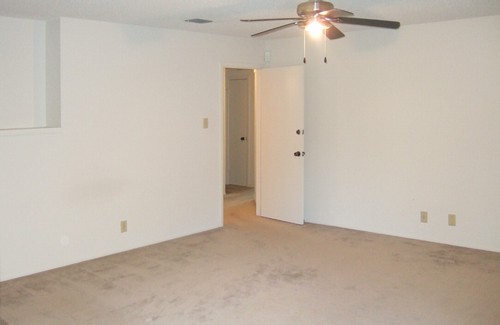 master bedroom with art niche and private master bath